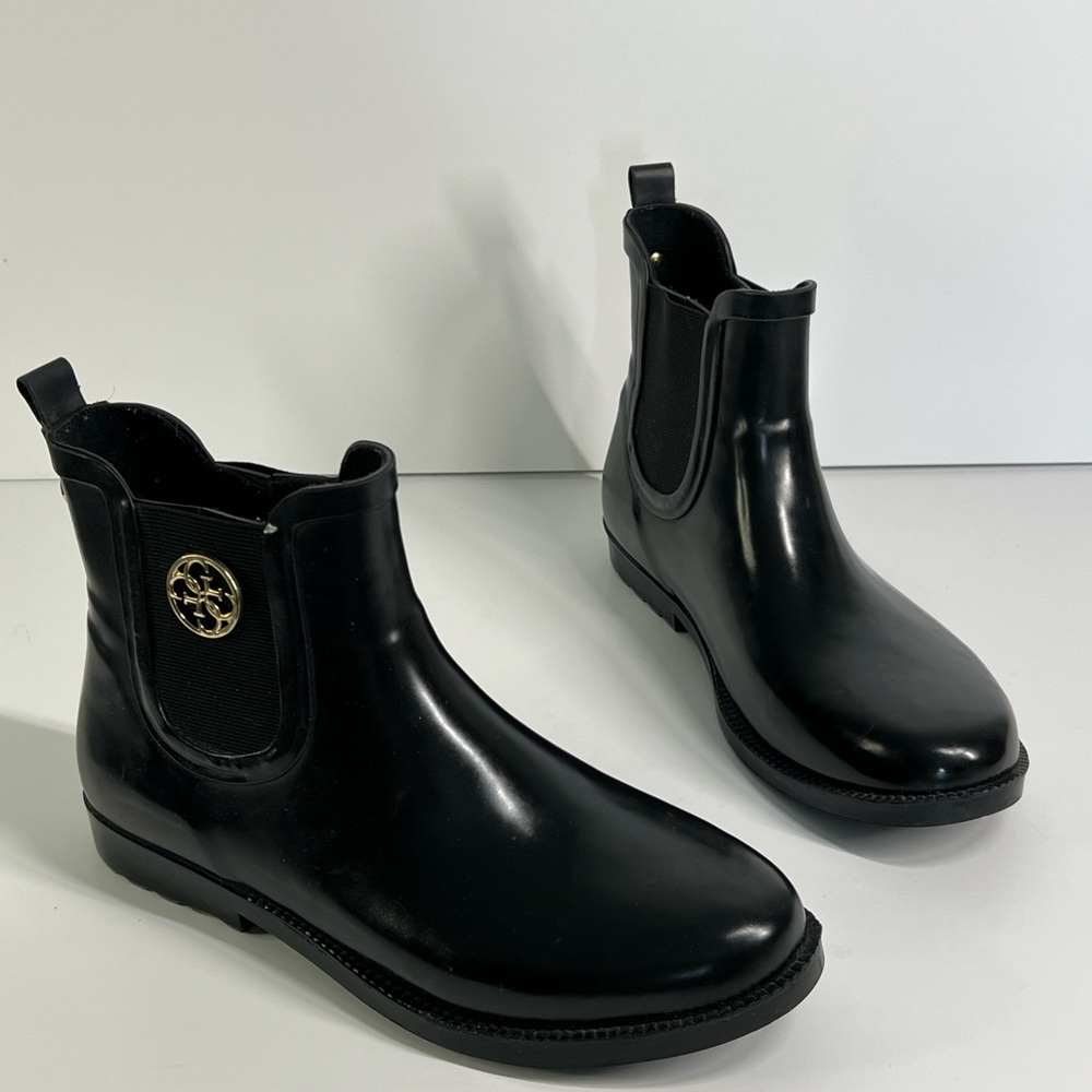 GUESS Women’s 9M Slip On Black Rain boot gold detail